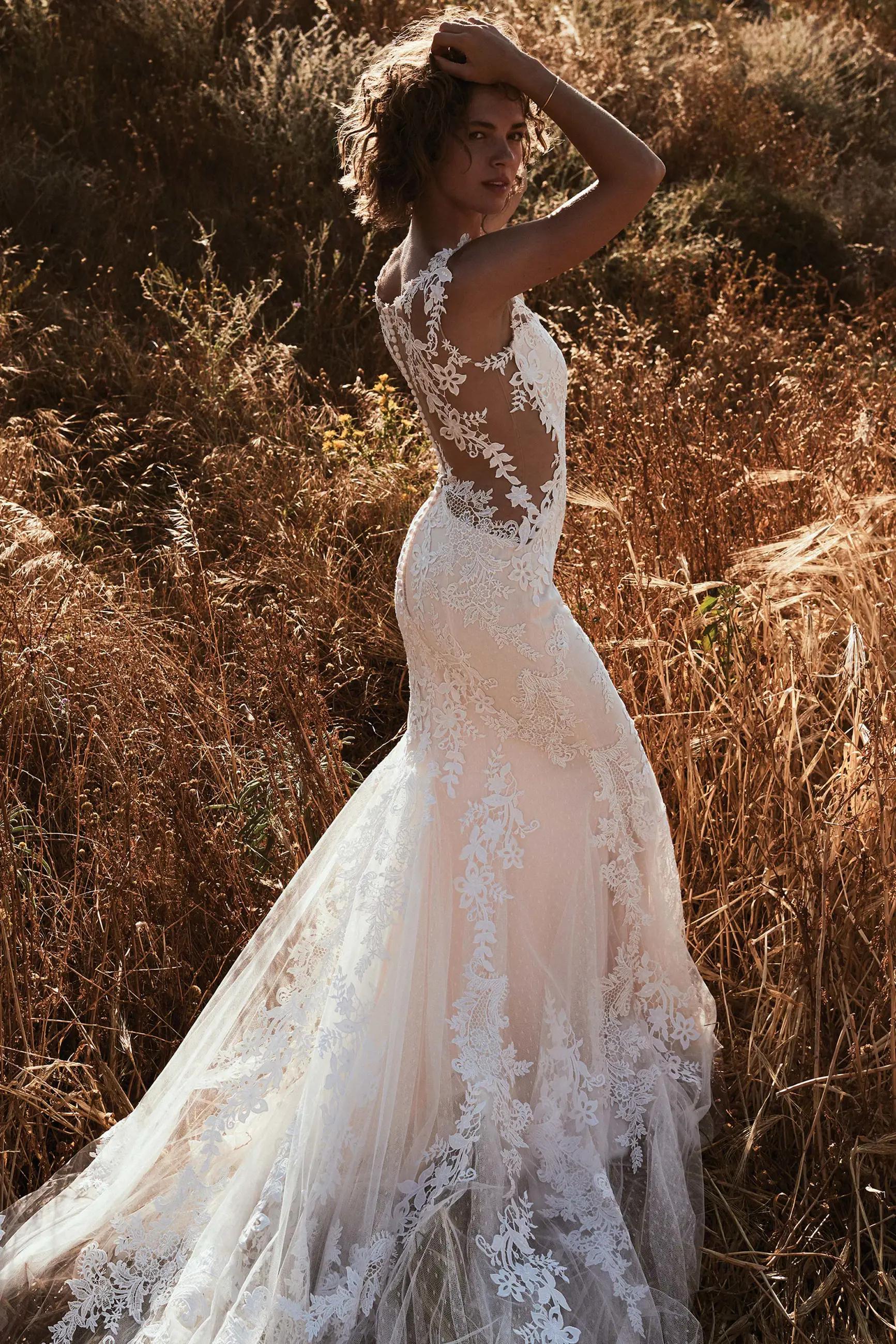 Model wearing a gown by Lillian West